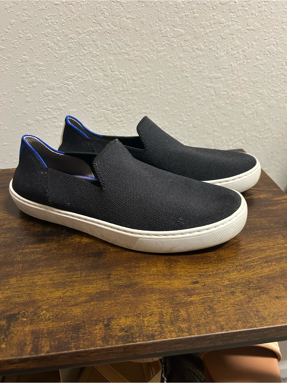 Women’s Black Rothy Slip-Ons